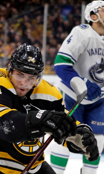 Horvat, Eriksson each score twice, Canucks top Bruins 8-5